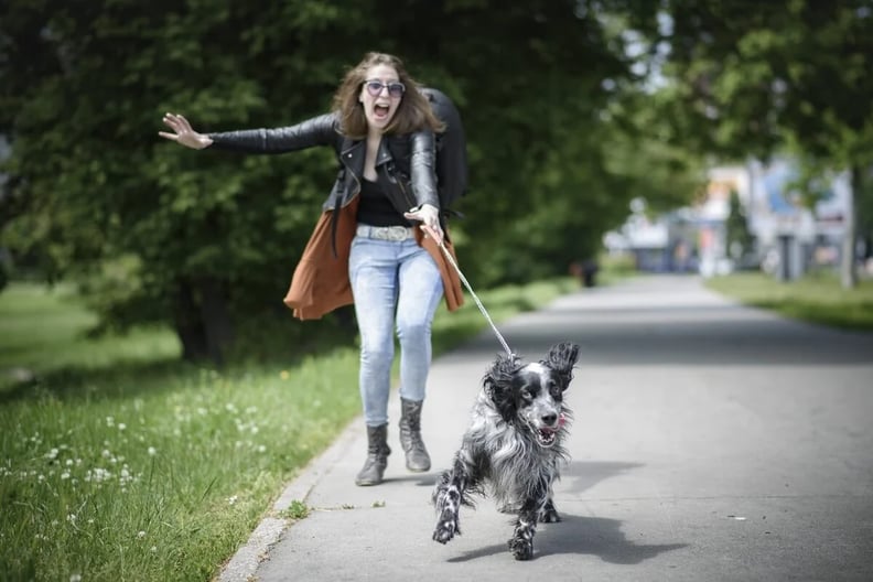 puppy-pulling-owner-on-leash